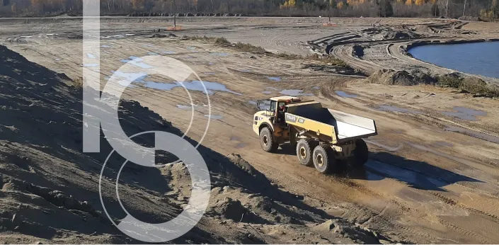 Industrial dump truck in field\